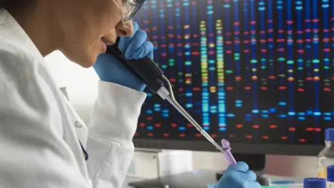 Tek Image Woman testing in a lab