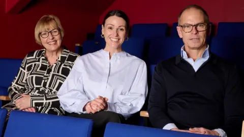 Andi Sapey/Sheringham Little Theatre Theatre director Debbie Thompson, Suranne Jones and chairman Jonathan Beak