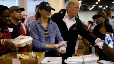 Reuters President Trump and First Lady Melania Trump help volunteers hand out meals at a relief centre in Houston, Texas, September 2, 2017