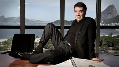 Getty Images Eike Batista atop his desk
