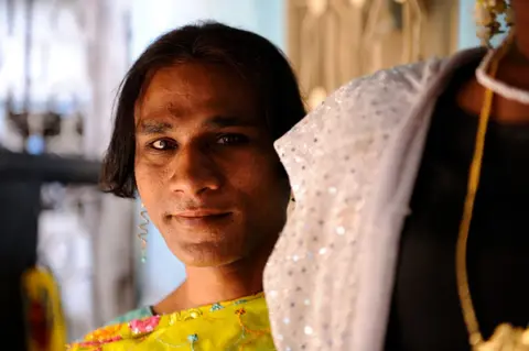AFP The Hijra community of Mumbai in Andheri (surbub of Mumbai), Indian hijras, or eunuchs, adopt a feminine gender identity, women's clothing and other feminine gender roles on March 15, 2012