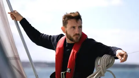 BBC Jeff Leigh-Jones pictured on a sailing boat