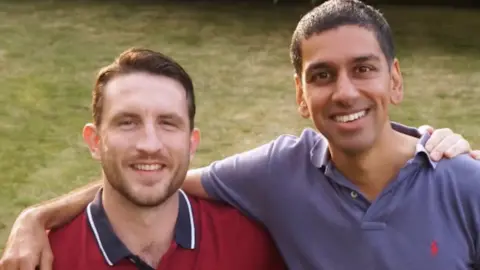 Lighthouse and YouTube Jeff Leigh-Jones and Jai Singh, photographed smiling with their arms round each other