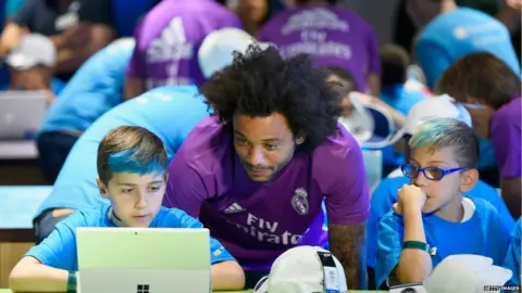 Getty Images Real Madrid star Marcelo on a team visit to the Microsoft store in New York