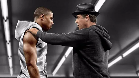 Warner Bros Pictures Ryan Coogler’s Creed (2015) is a spin-off from the franchise that follows one of Apollo Creed’s sons, played by Michael B Jordan (Credit: Warner Bros Pictures)